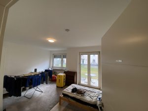 Wohnzimmer mit Zugang zur Terrasse