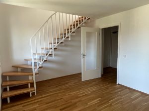 Wohnbereich mit Treppenaufgang